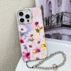 Чехол Electroplating Laser Flower Phone Case with Wrist Strap  для iPhone 16 Pro - Cosmos Flower